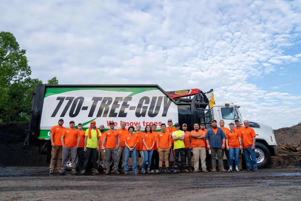 The 770-Tree-Guy crew in front of a company truck